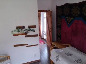 Фото номера Двухместный номер с 2 отдельными кроватями и душем Гостевой дом Ashu Guesthouse г. Shabdan 2